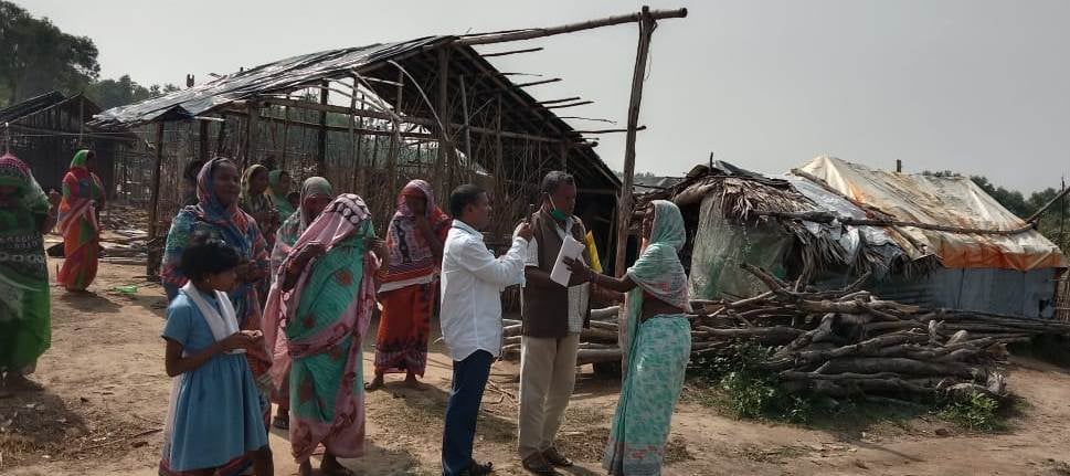 Fact finding committee interacting with the victims